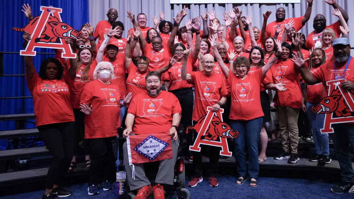 2023 NEA RA delegates pose for a fun picture