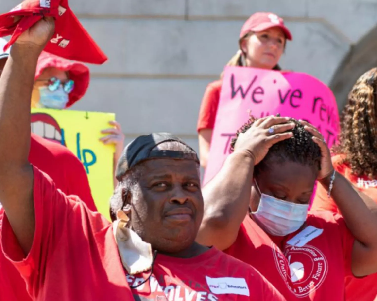 a close up of participants at a rally