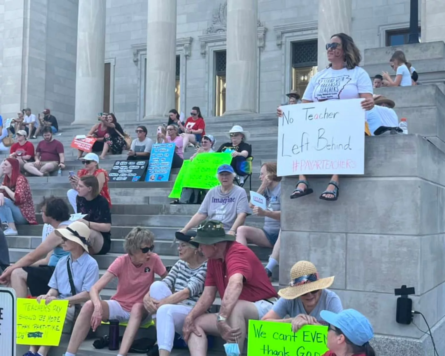 AEA members on the capitol steps to advocate for educator pay