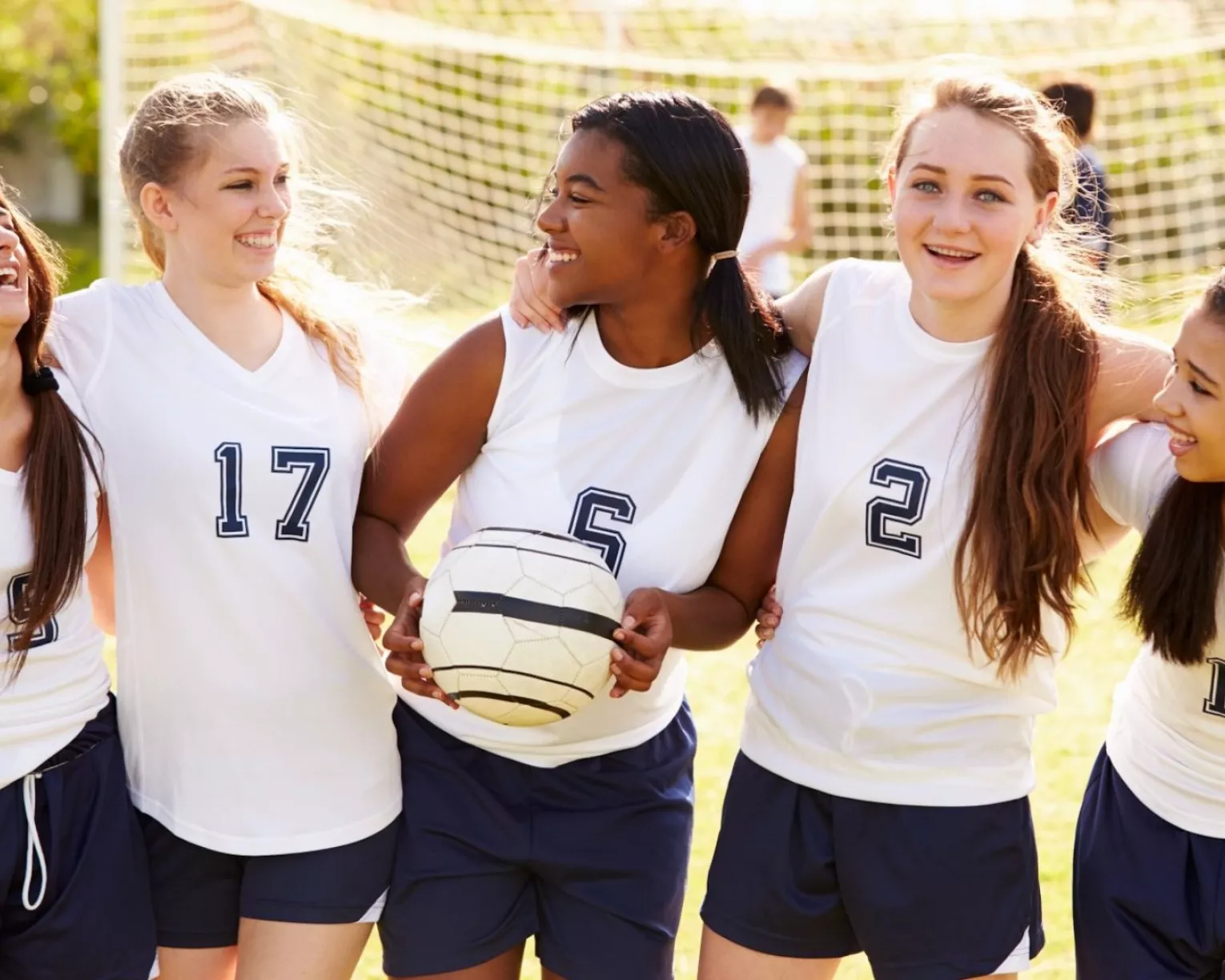 Girls in soccer uniforms