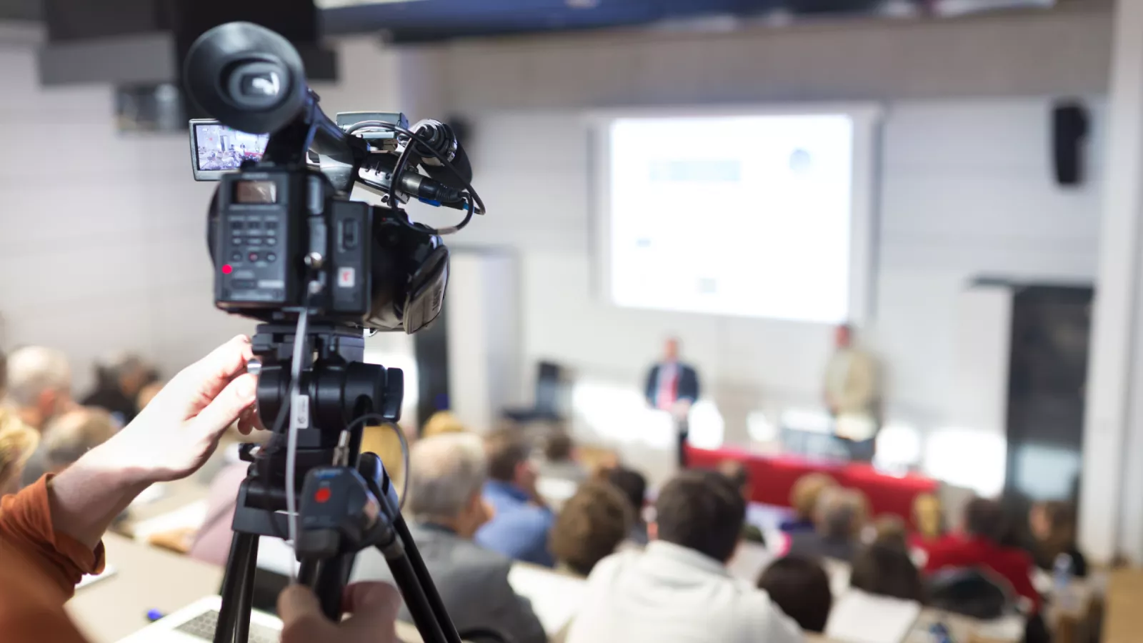A picture from a cameraman's perspective at press conference