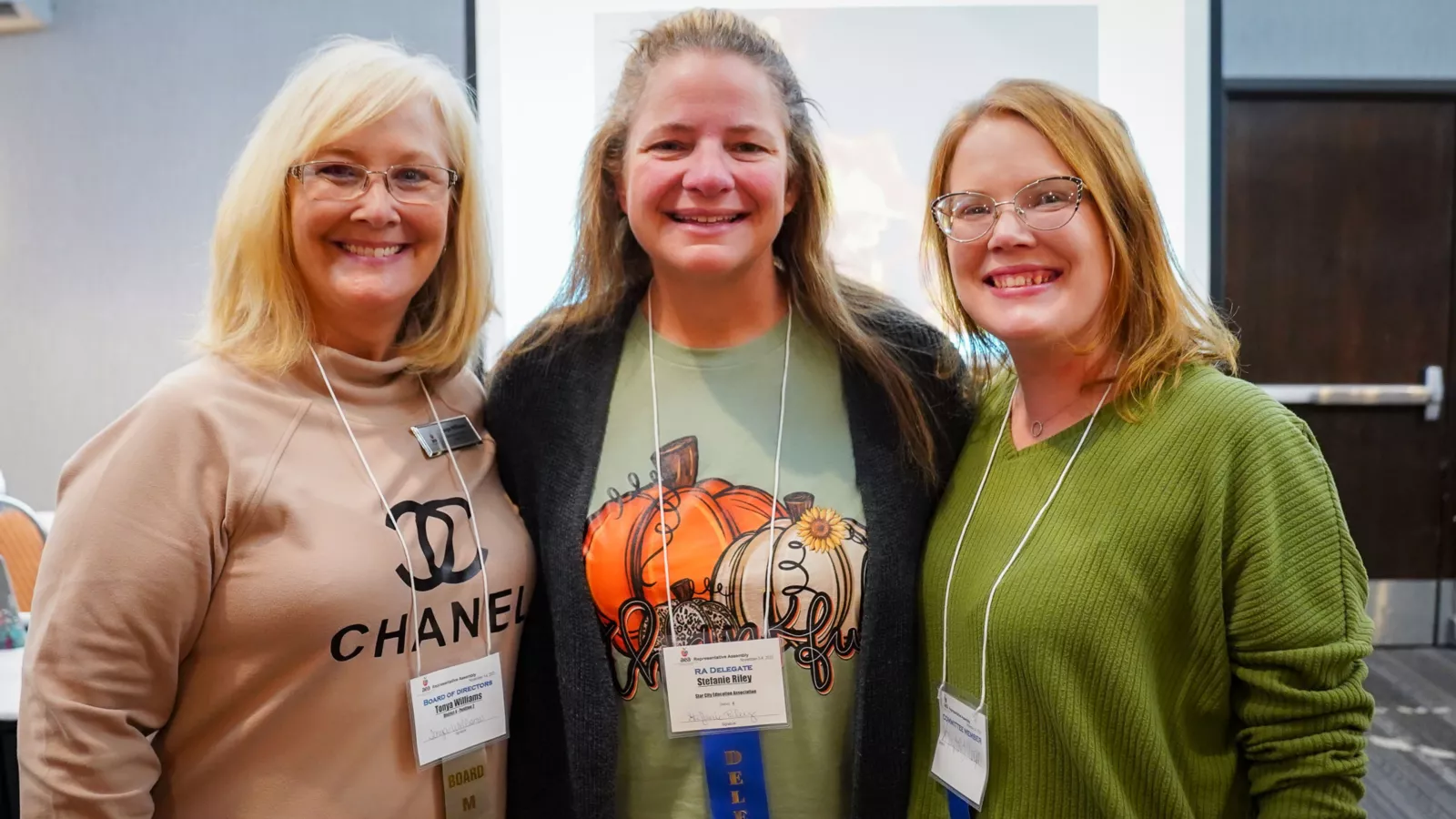 Three AEA RA delegates pose for a picture