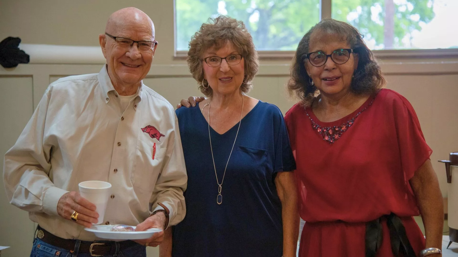 AEA Retired members pose for a picture at the reopening of the AEA building in 2022