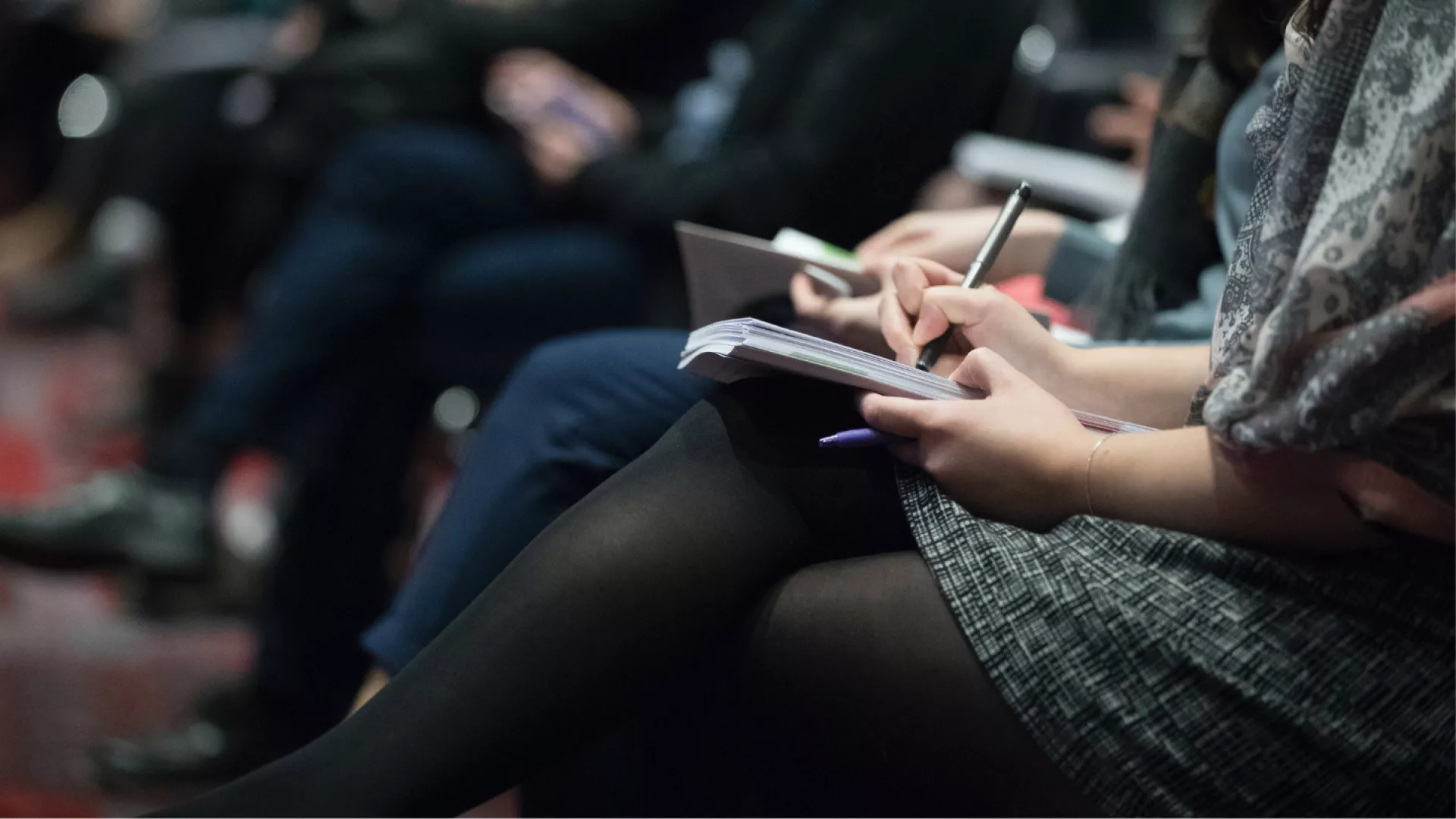 A reporter with a notepad