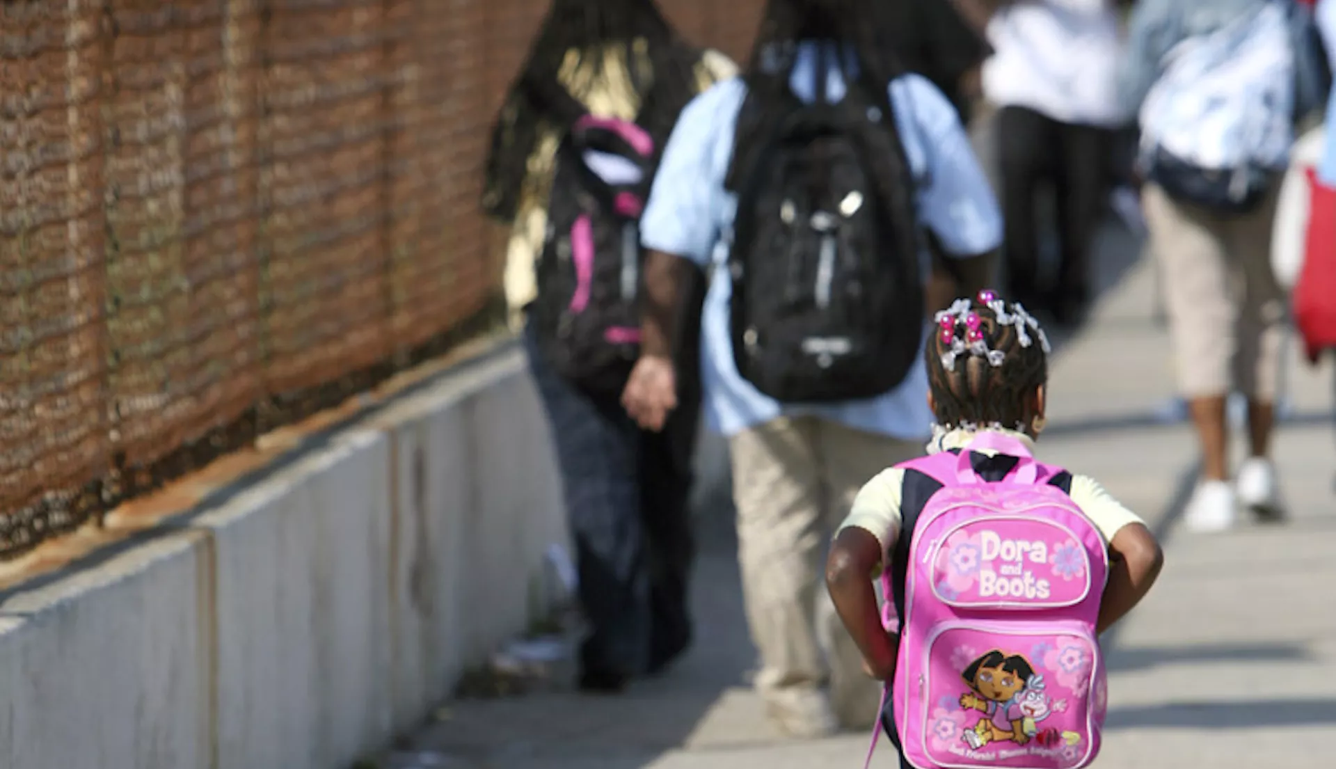 student walking to school