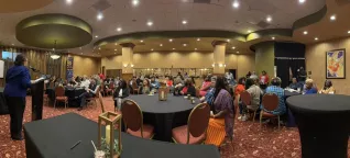 speaking to a crowd