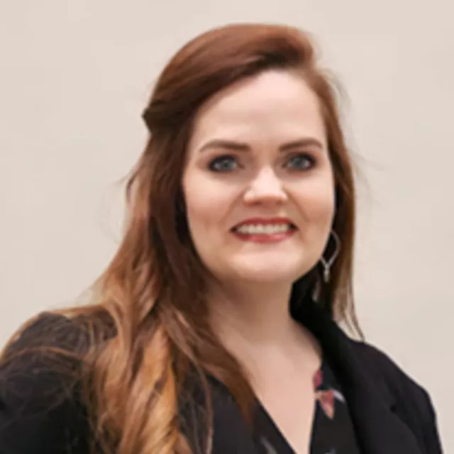 A headshot of Renee Johnson