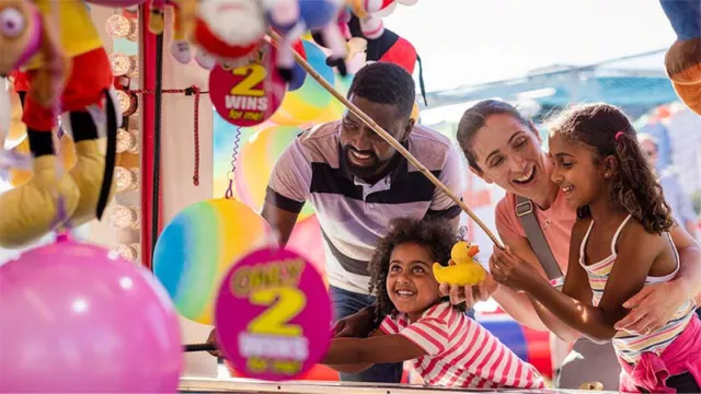 a family at an amusement park